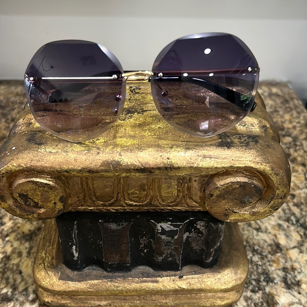 Rimless polygon sunglasses **Free with purchase of $30 or more **